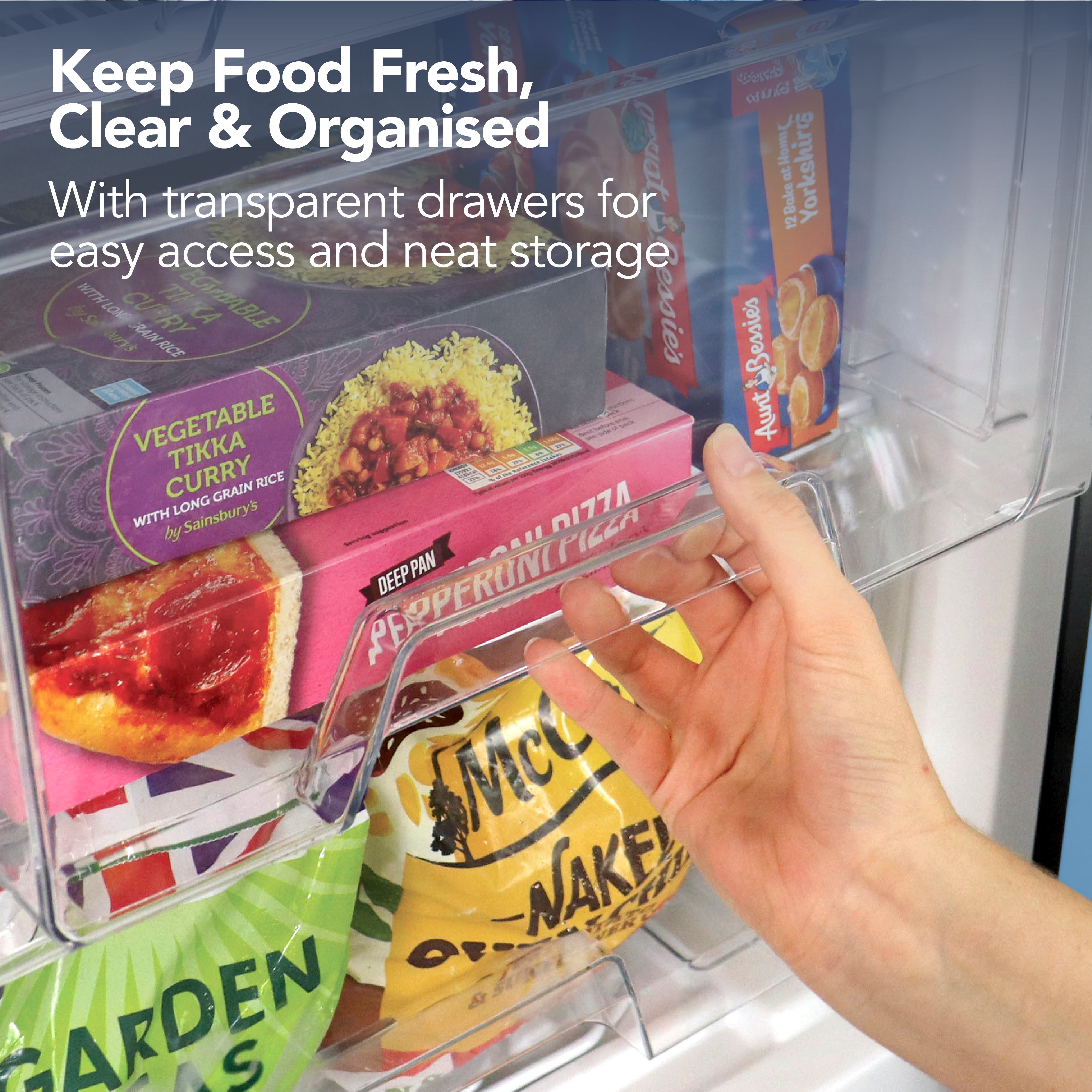 A hand opens a transparent drawer in the Igenix Under Counter Freezer (88L, Black, Reversible Doors), showing neatly organised pizzas, curries, and veggies. Text: Keep food fresh & organised with clear drawers for easy access and neat storage.