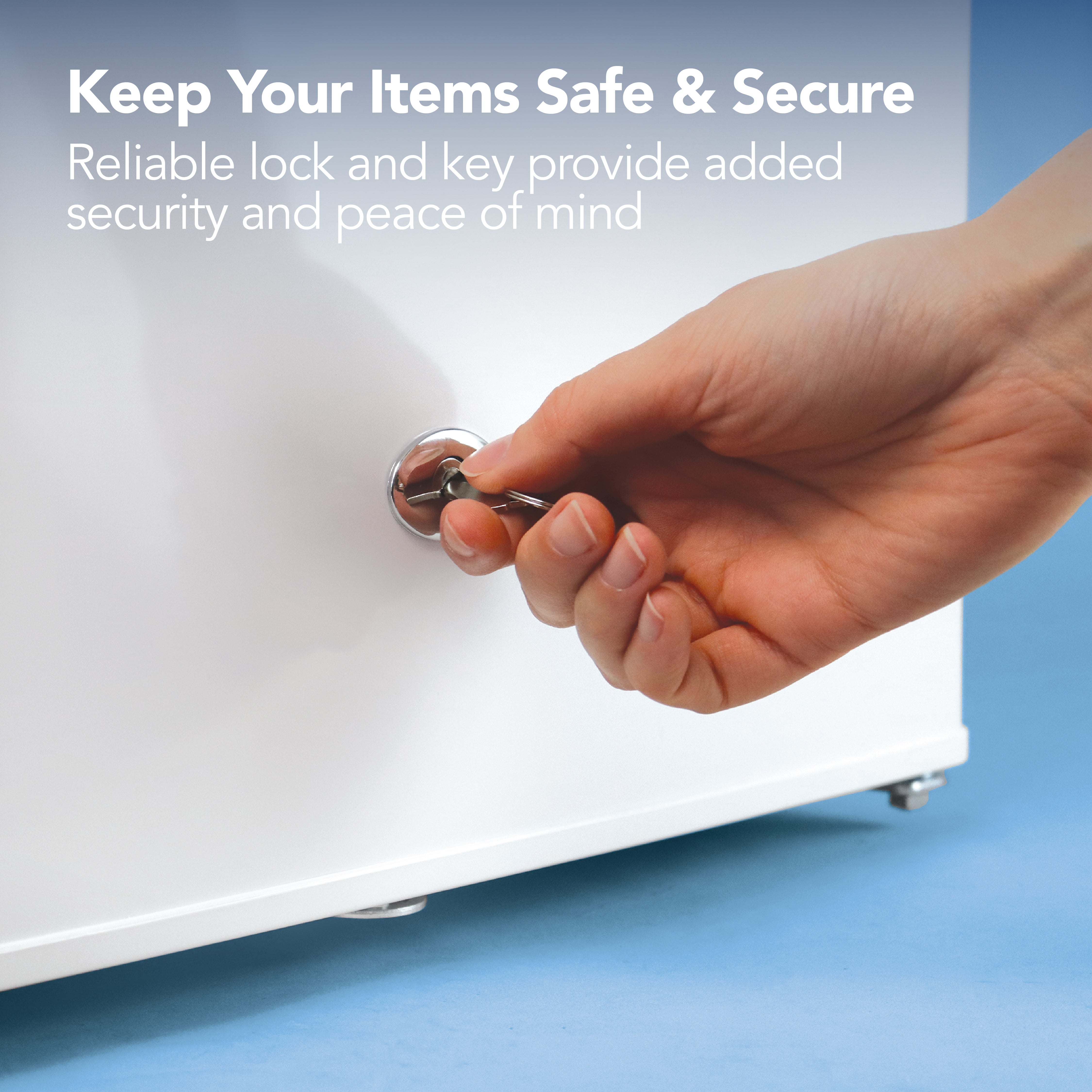 A hand inserts a key into the lock on an Igenix Table Top Freezer with Lockable Door, 33 Litre, White. Text above reads: Keep Your Items Safe & Secure—reliable lock and key add security and peace of mind to your compact freezer.