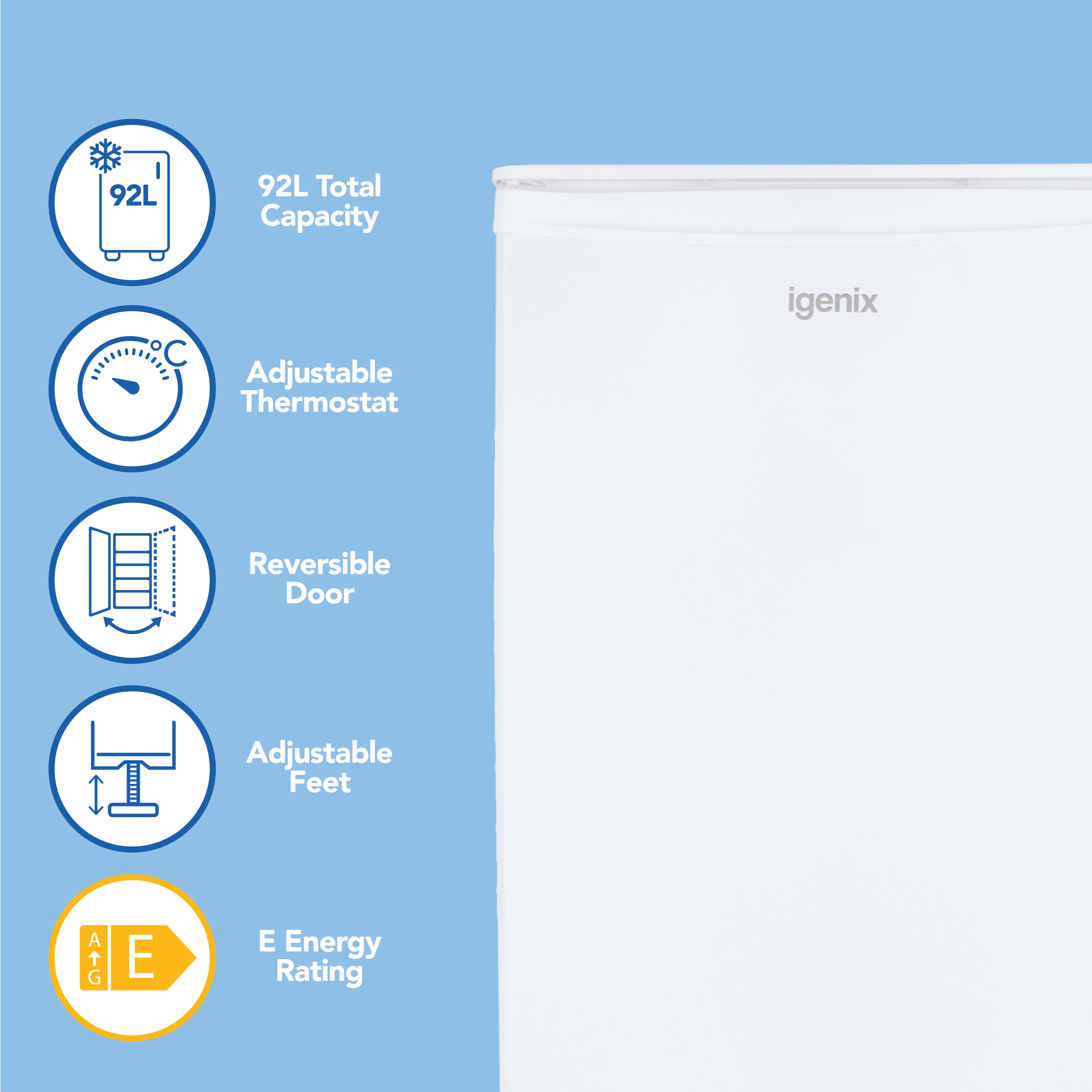 The Igenix Under Counter Larder Fridge, 92 Litres in white, features an adjustable thermostat, reversible door, adjustable feet, and E energy rating. Ideal for small kitchens or home offices. Shown here against a blue background.