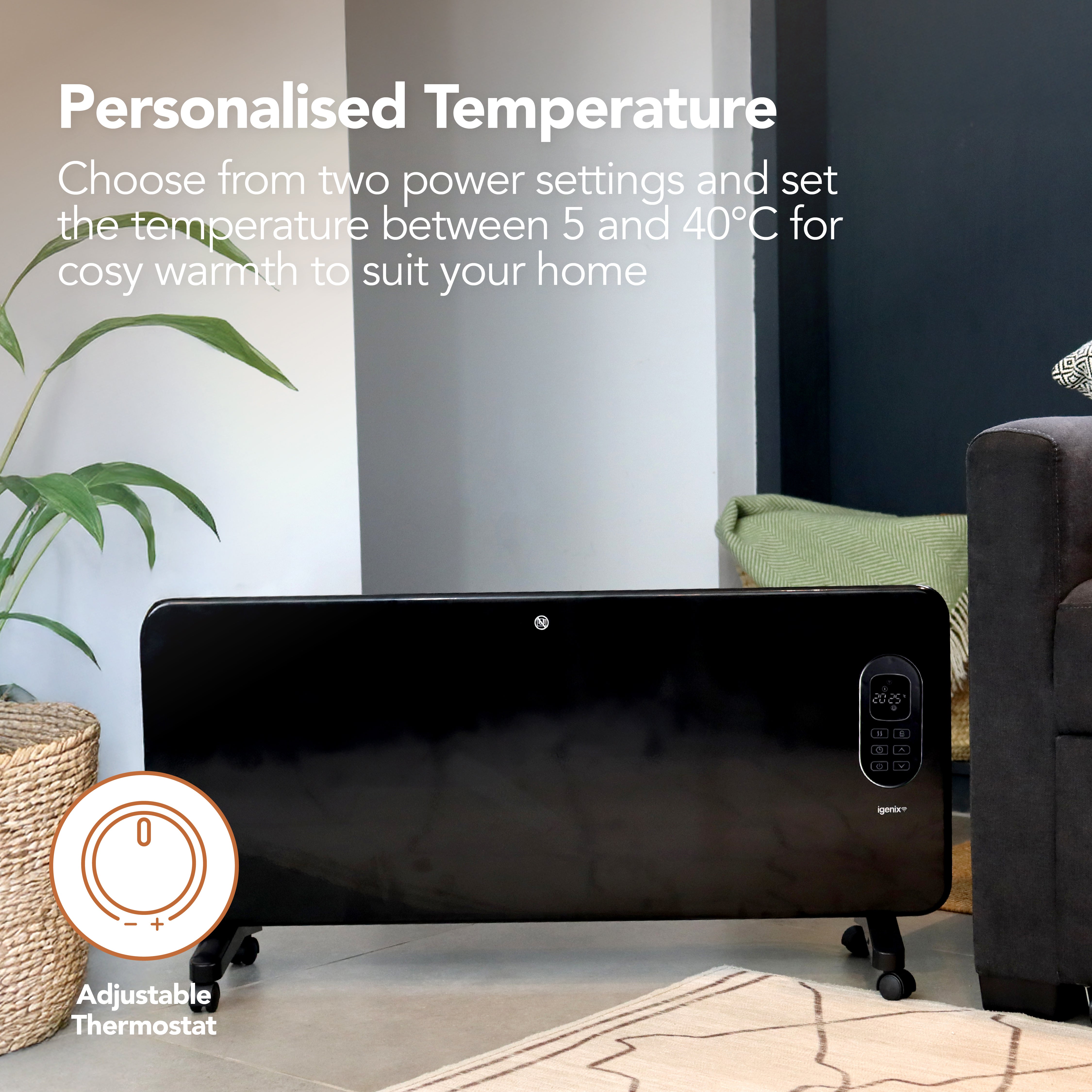 The Igenix Smart Electric Panel Heater, 2000W in black, sits on the floor between a woven basket and a dark armchair. Text highlights its adjustable temperature settings, thermostat features, and Alexa compatibility.