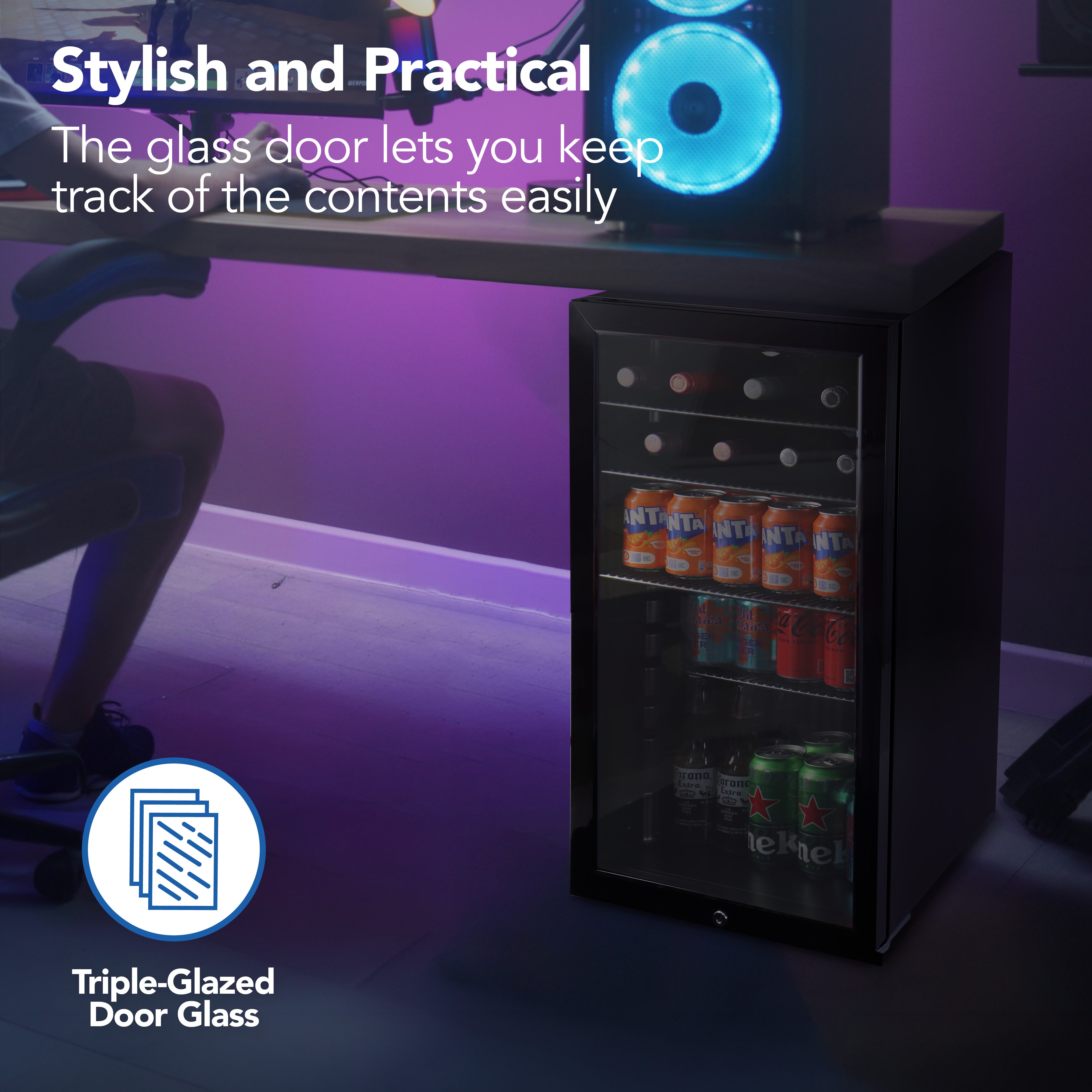 The Igenix Under Counter Drinks Fridge, 98 Litre, Black features a triple-glazed glass door for clear viewing of cans and bottles. Stylish and modern, it's perfect for easy access and content tracking under a desk or counter.