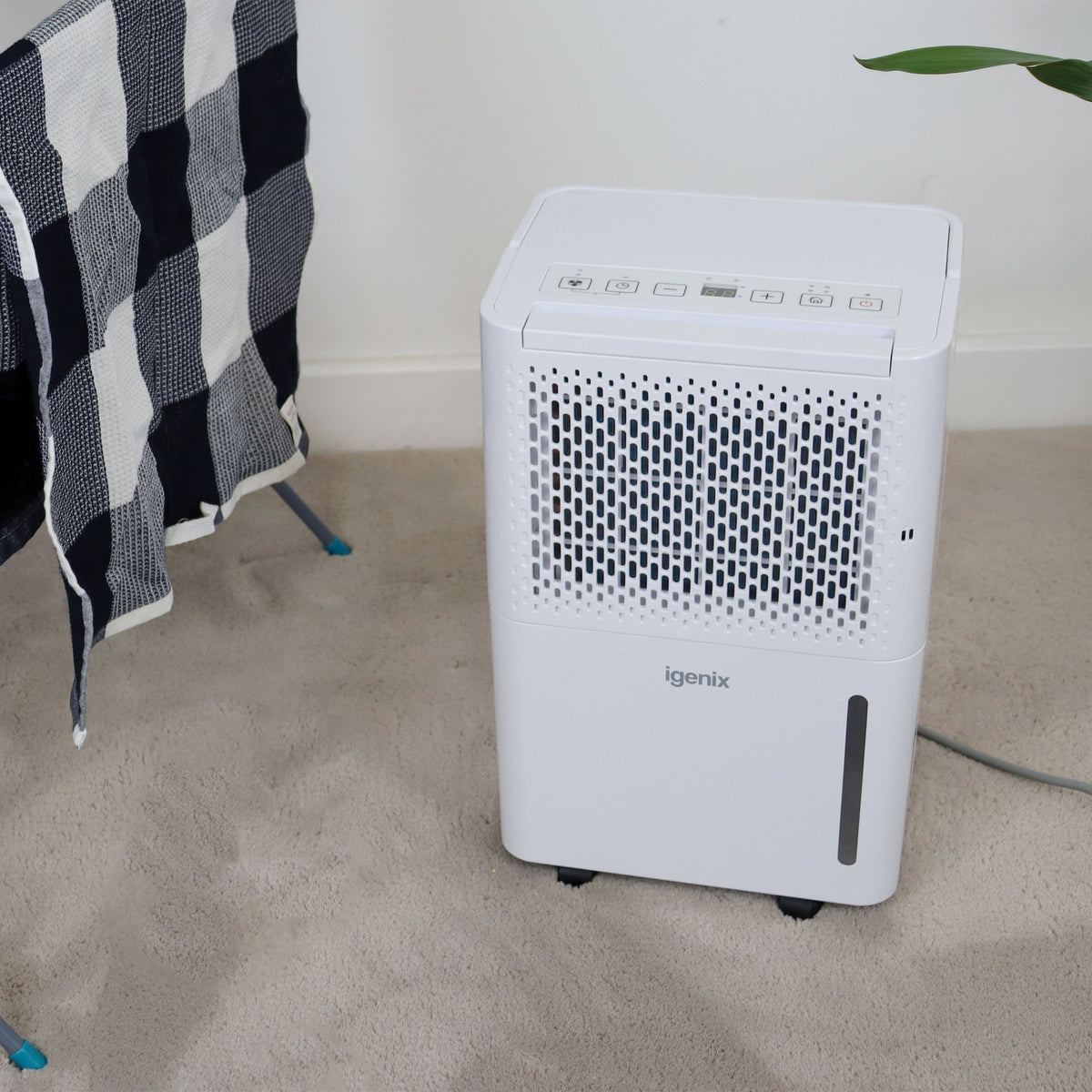 White Igenix Portable Dehumidifier, Extracts 12 Litres per Day, featuring a digital control panel on top and a water level indicator on the front.