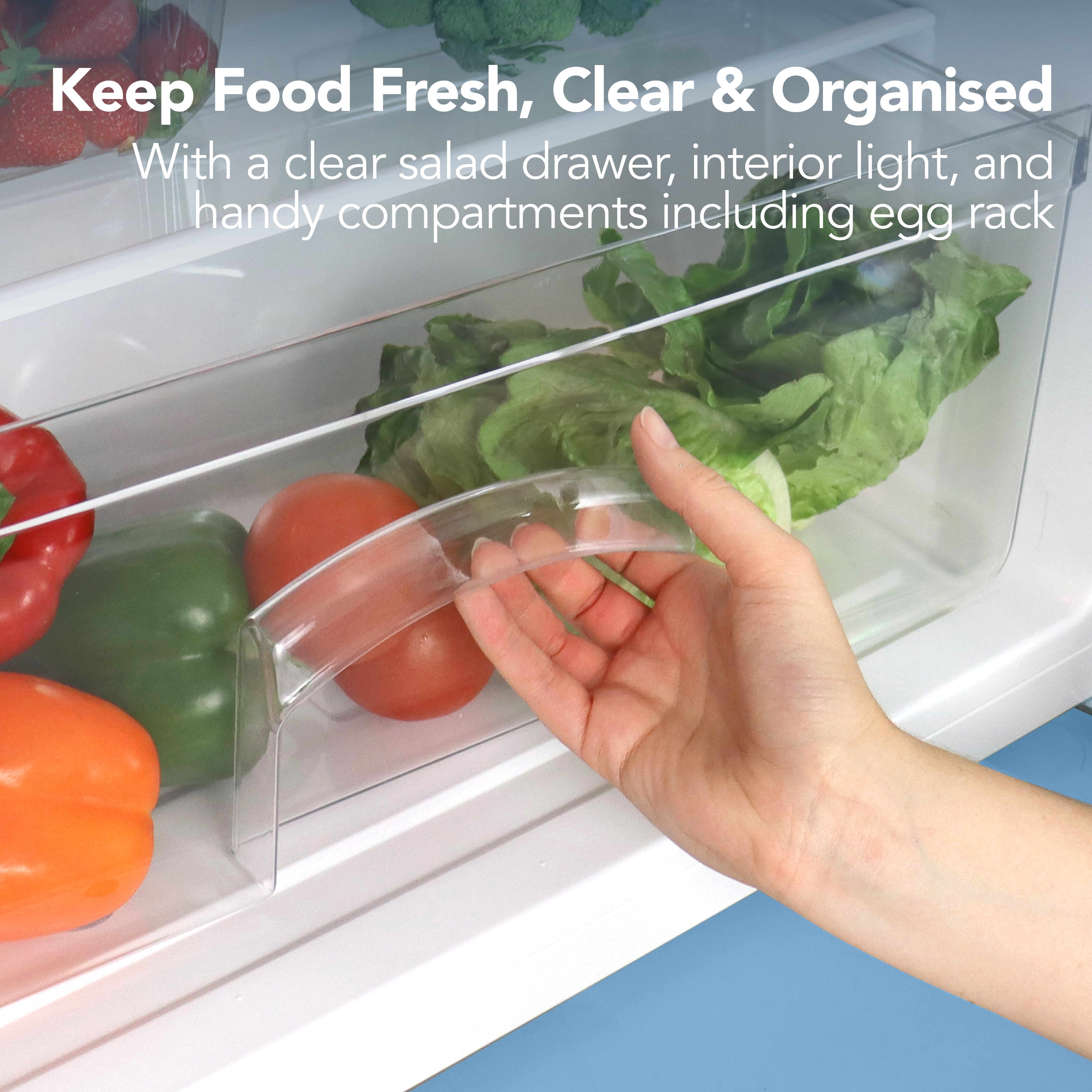 A hand opens the clear salad drawer of the Igenix Under Counter Larder Fridge, 127 Litre, Silver, revealing fresh lettuce and bell peppers, with text highlighting food freshness and organisation.