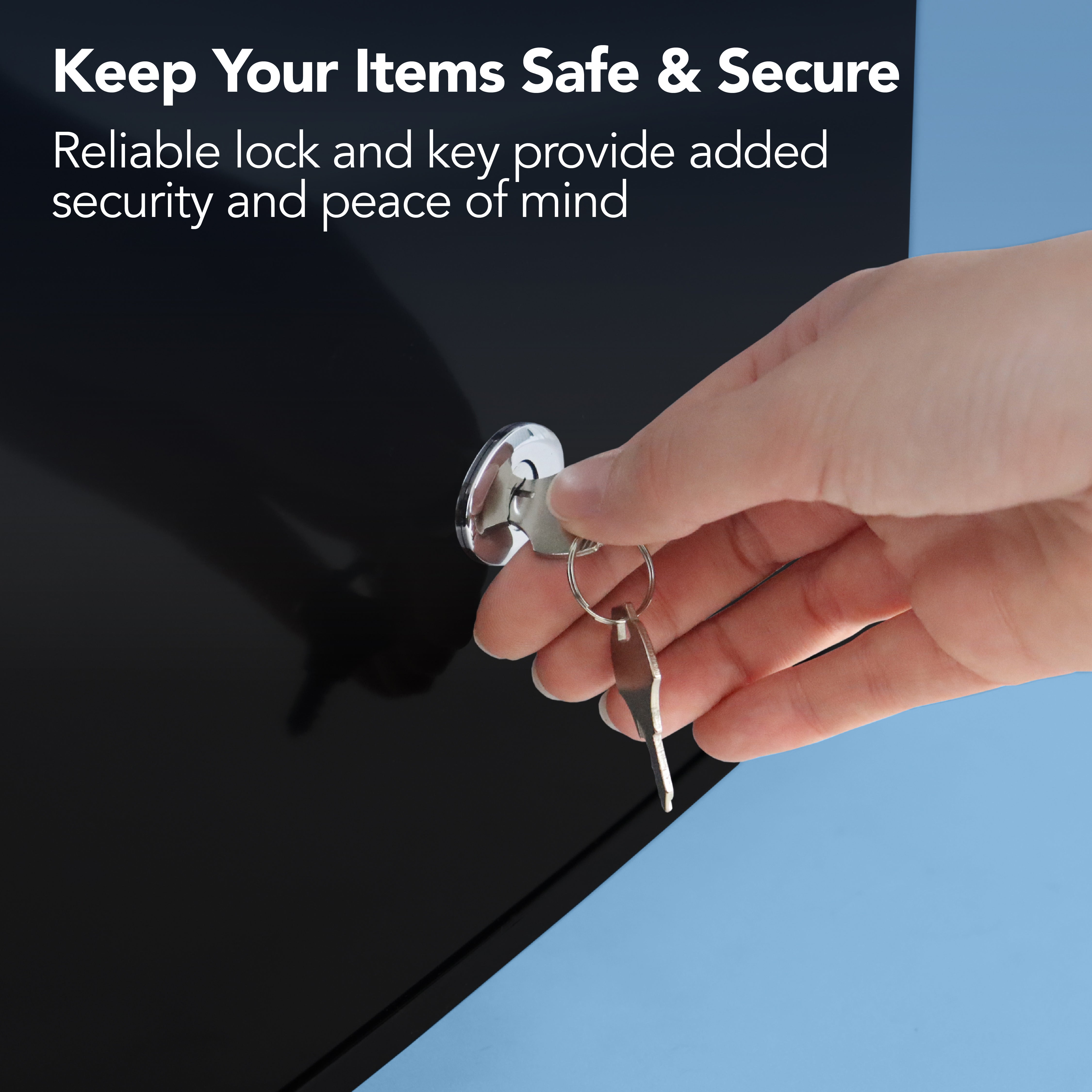 A hand inserts a key into the lock on the black Igenix Table Top Freezer with Lockable Door, 33L. Text: Keep your items safe & secure—reliable lock and key ensure added security and peace of mind for your compact freezer.