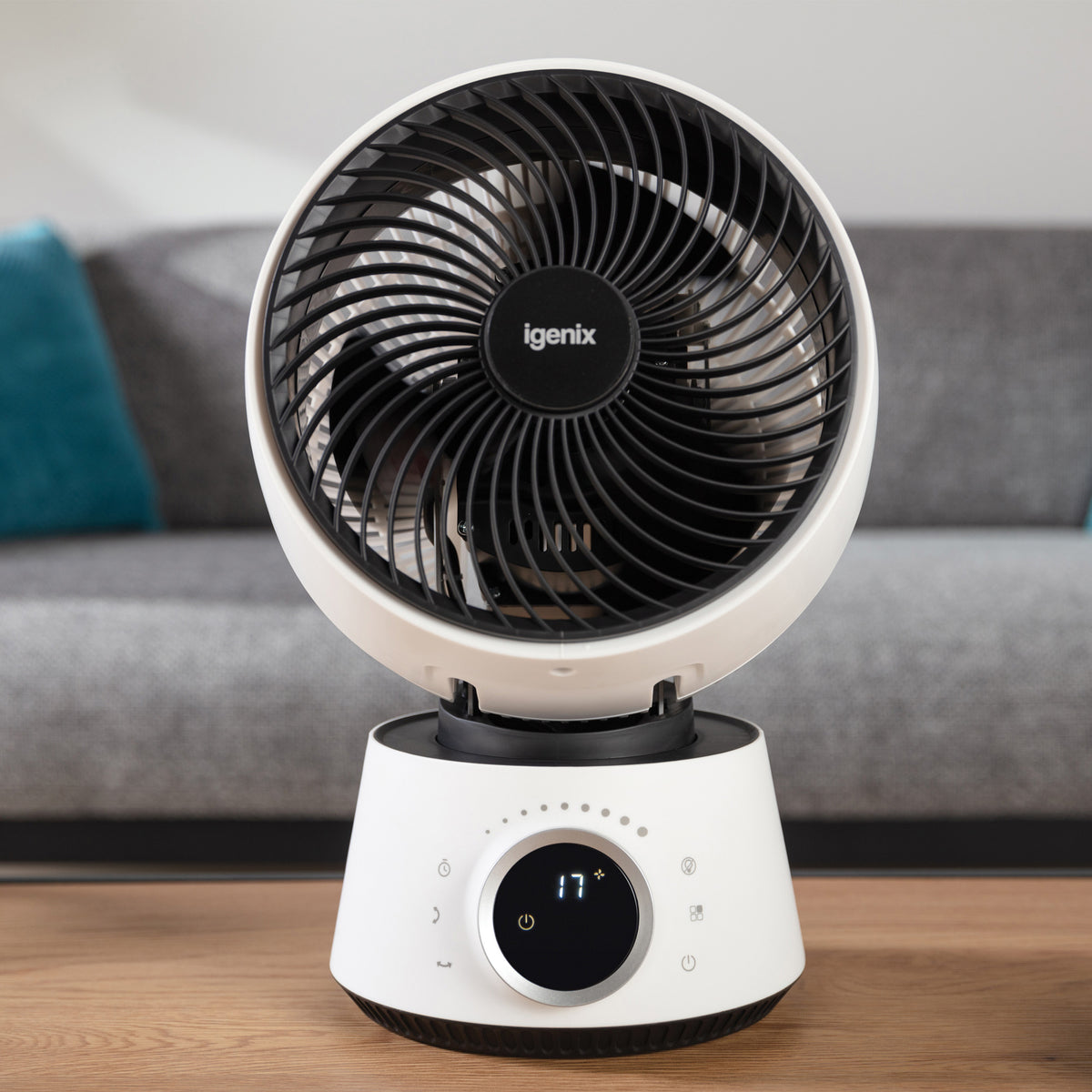A white Igenix Digital Air Circulator Turbo Fan, 9 Inch, with a round black grille and a digital display showing 17 on its circular base.
