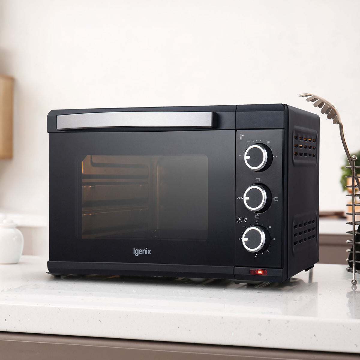 Igenix 25L Mini Oven, Black, with a glass door and three control dials on the front.
