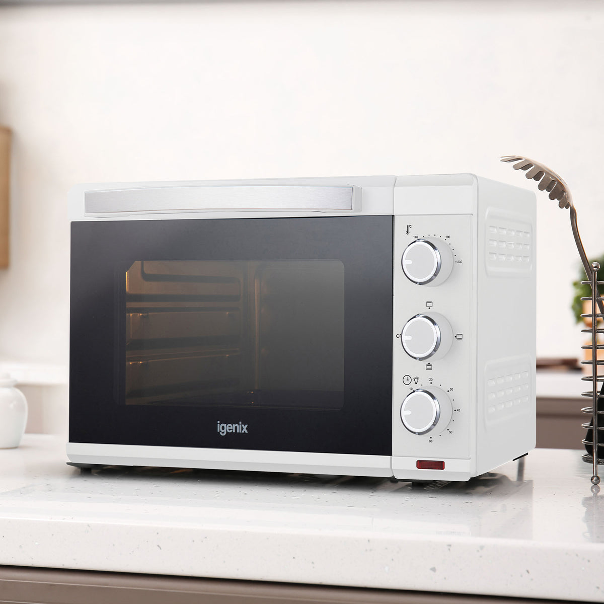 White Igenix 25L Mini Oven for countertops, featuring a glass door and three control dials on the right side.