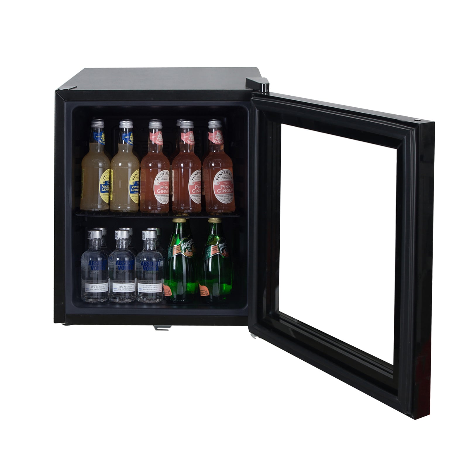 An open Igenix Tabletop Drinks Fridge (48 L, Black) displays bottled drinks on two shelves, including clear bottles, green glass bottles, and brown-labeled bottles.